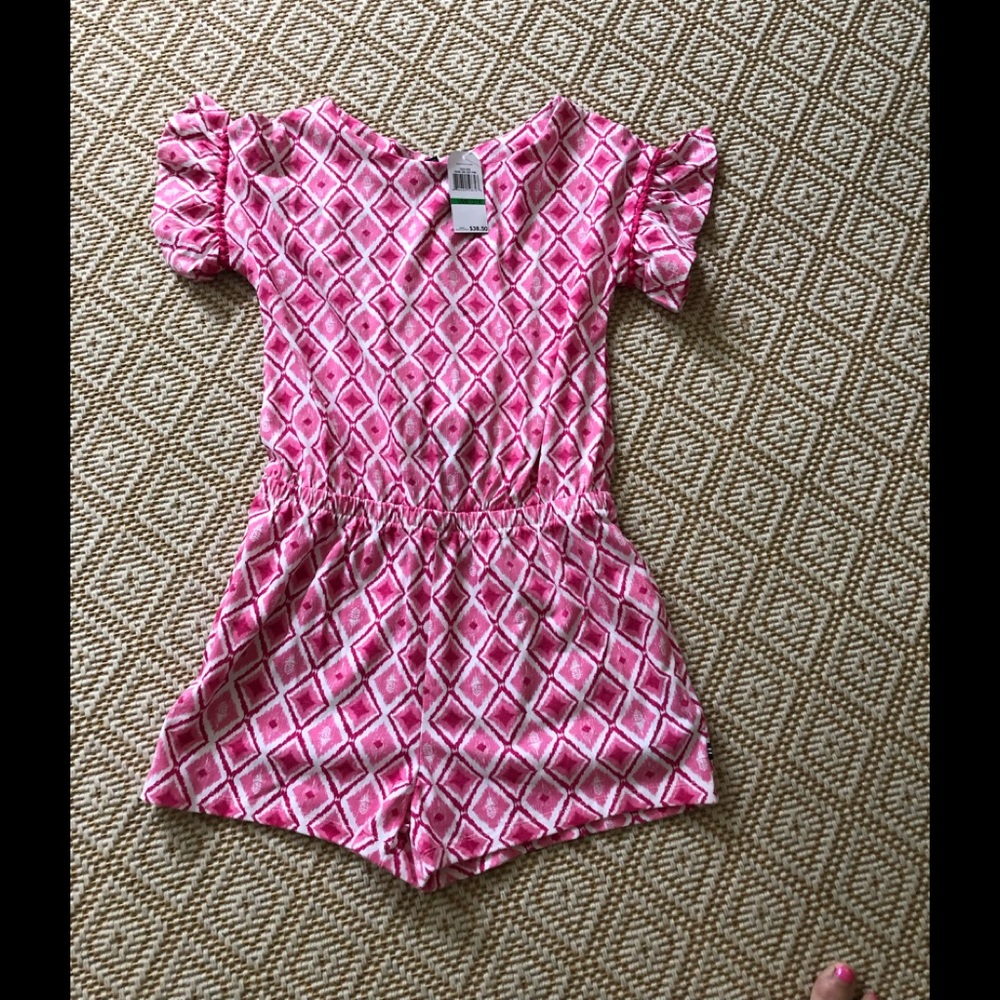 Girl’s large(12/14) adorable pink and white romper. Brand new with tags.